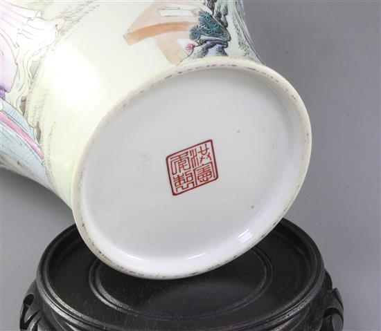 A Chinese famille rose baluster shaped vase, 20th century, height 33cm, wood stand